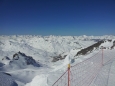 Ranní pohled z horní stanice sedačkové lanovky Péclet do údolí Val Thorens